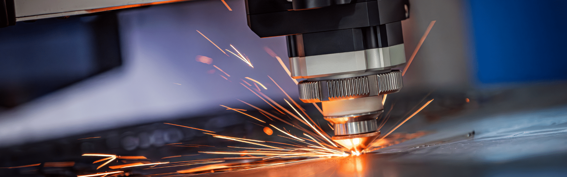 Han's Laser fiber laser cutting machine cutting sheet metal with visible spark trail