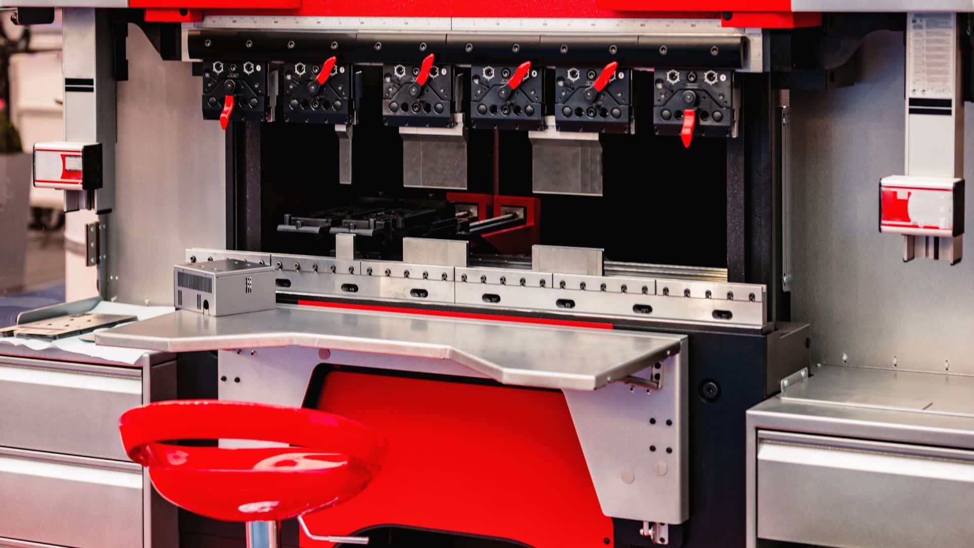 CNC press brake with punch and V-die tooling set up for sheet metal bending